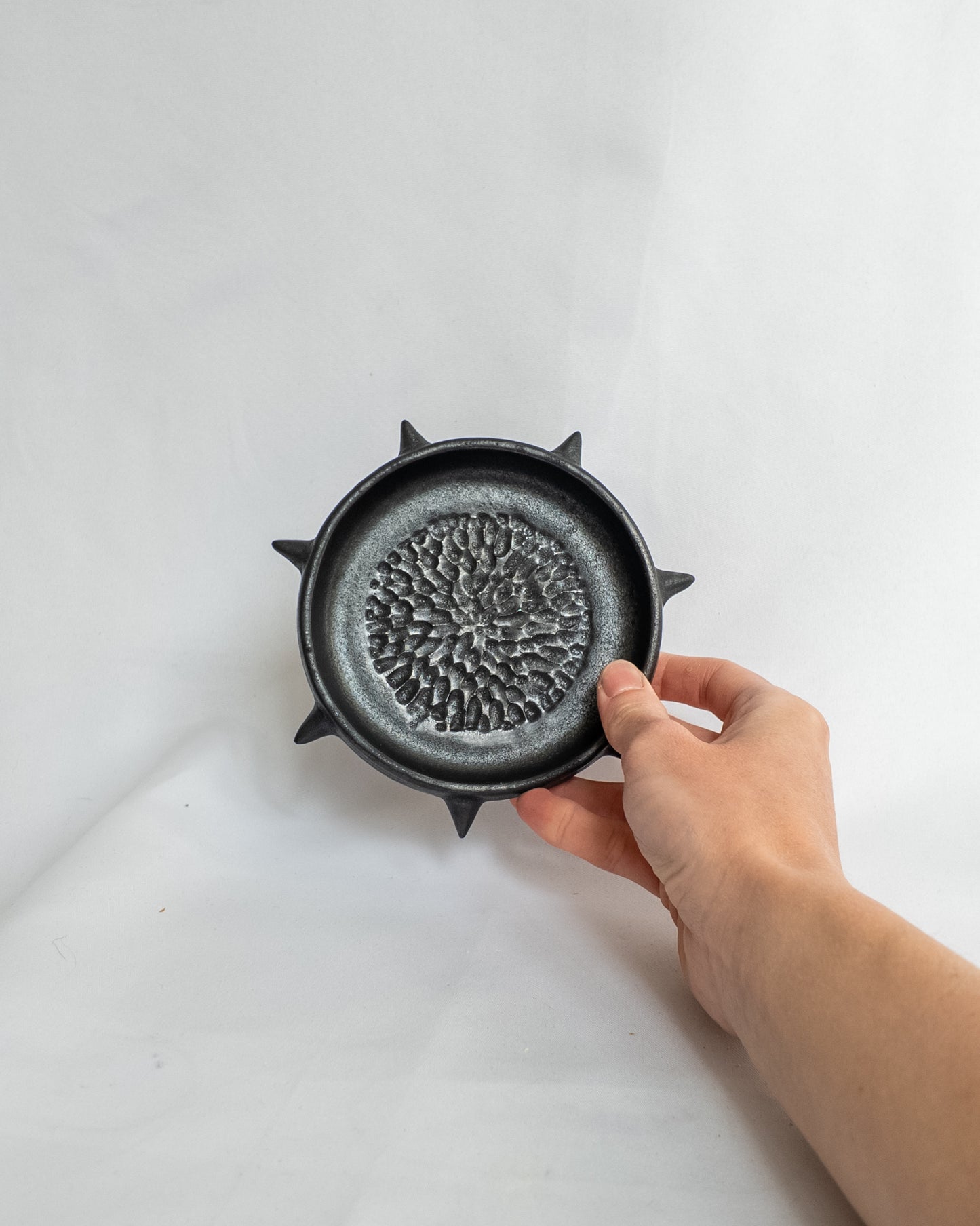 Spiky garlic grater