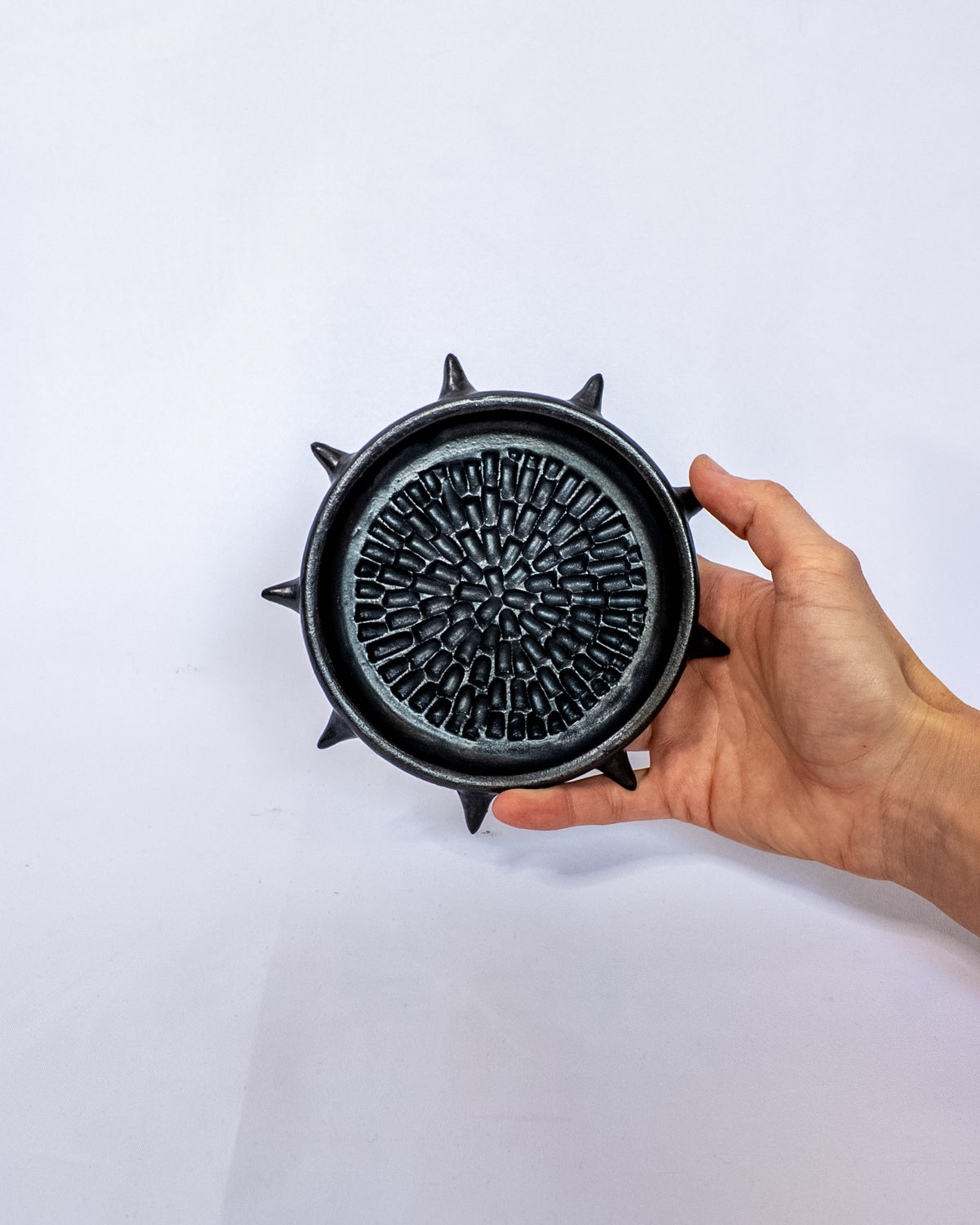 Spiky garlic grater