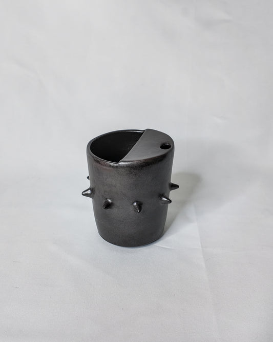 Spiky ceramic travel cup