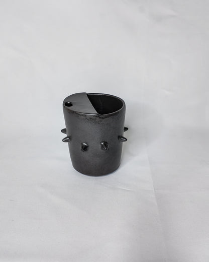 Spiky ceramic travel cup