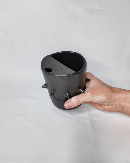 Spiky ceramic travel cup