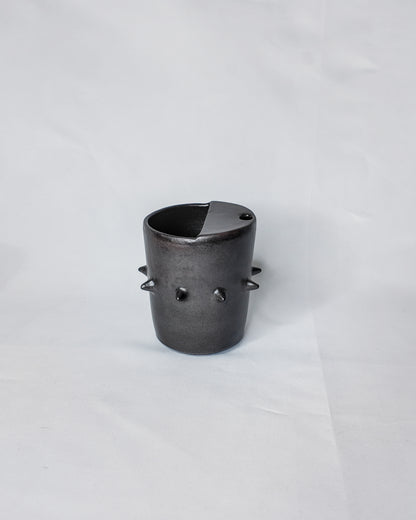 Spiky ceramic travel cup