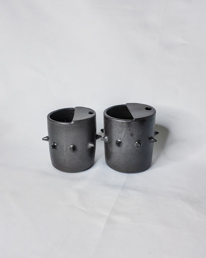 Spiky ceramic travel cup