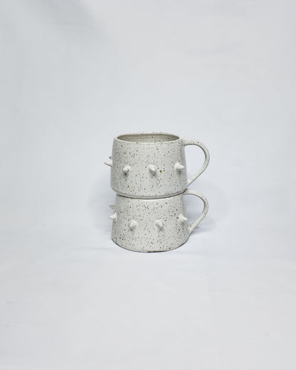 Speckled spiky mug