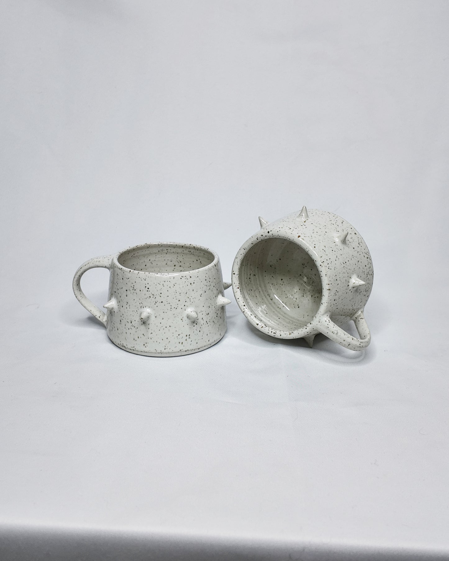 Speckled spiky mug