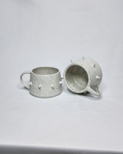 Speckled spiky mug