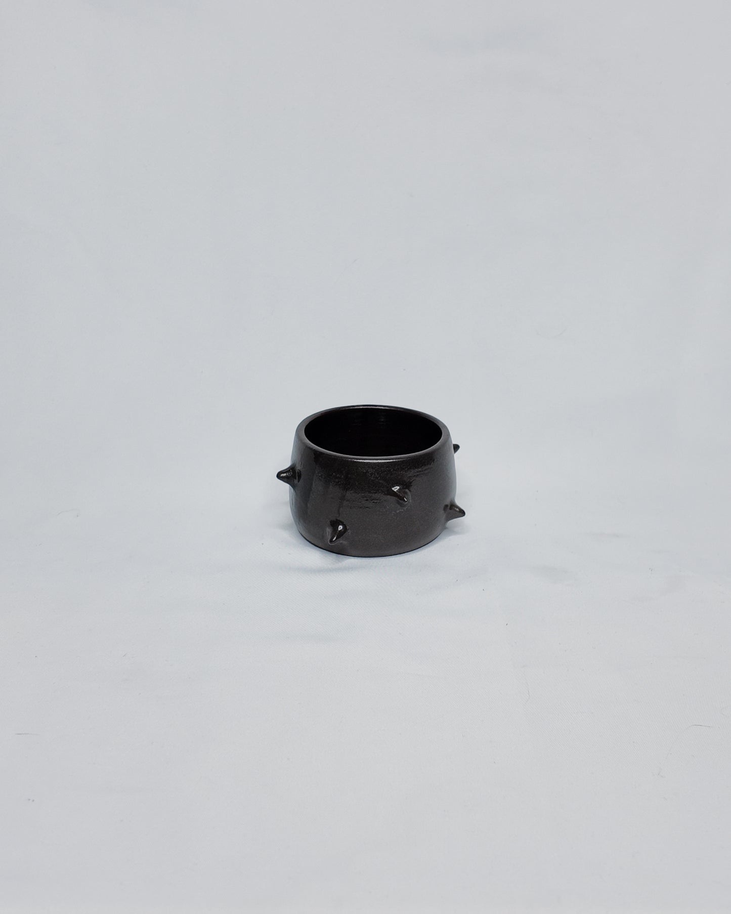 Spiky cup without handle
