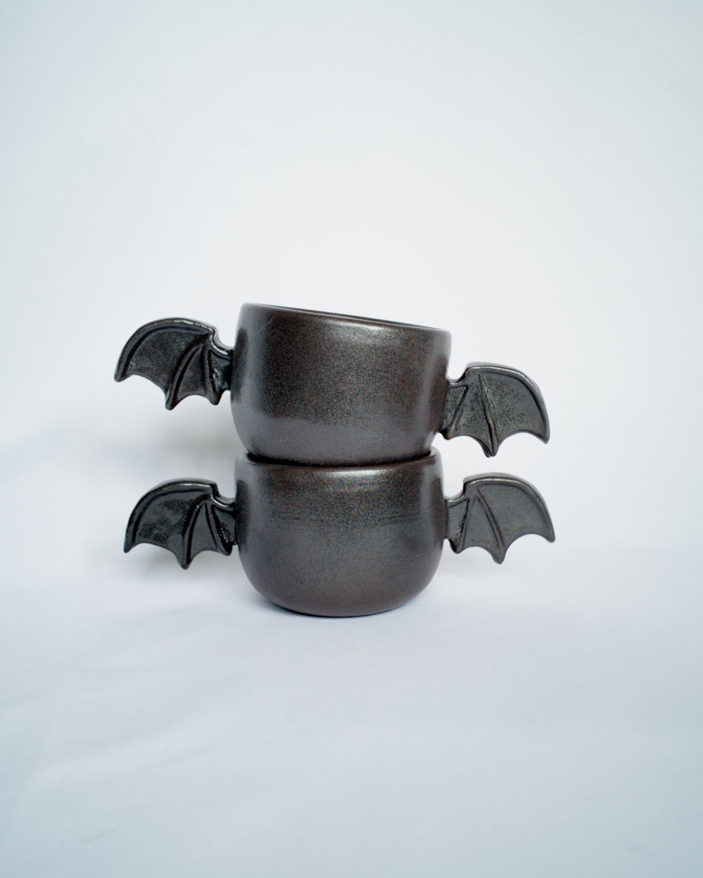 Double bat cup