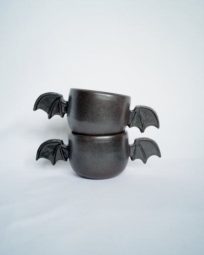 Double bat cup