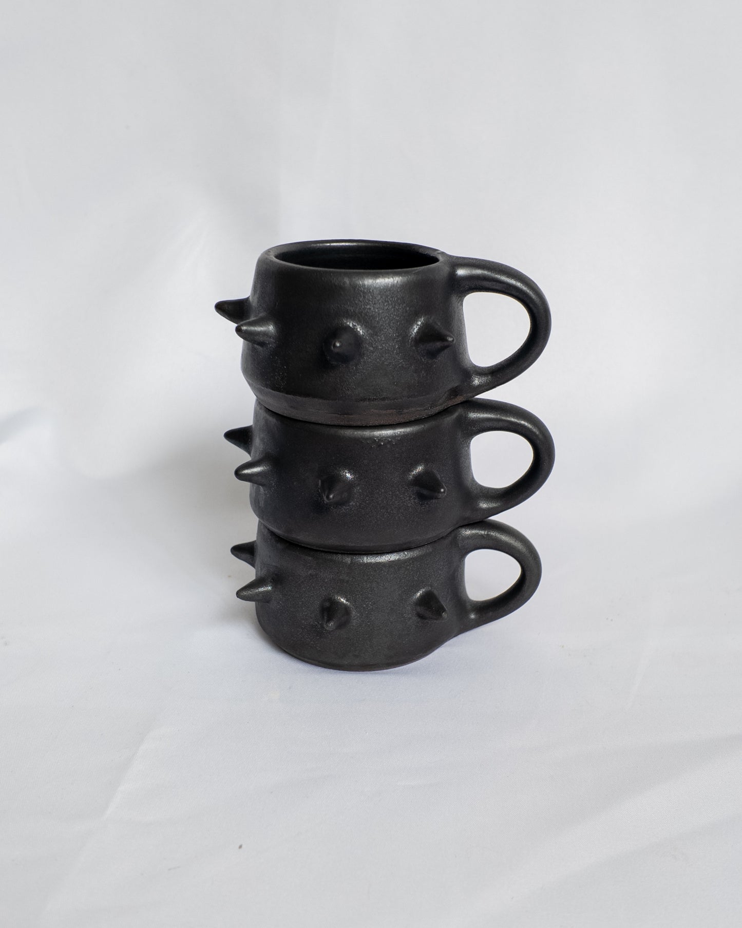 Spiky espresso cup with handle