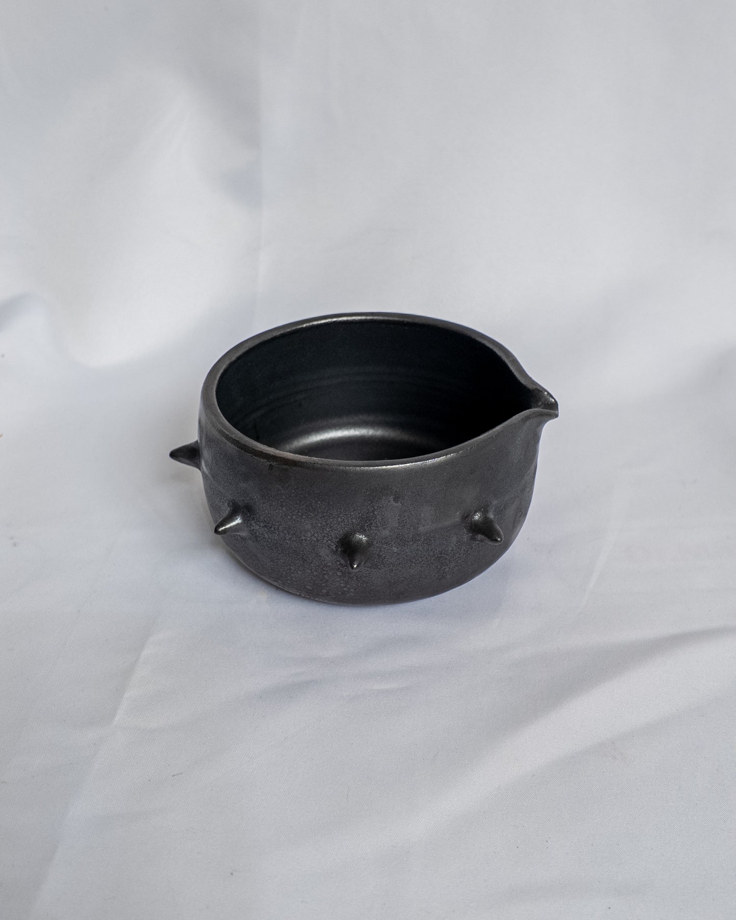 Black spiky matcha bowl