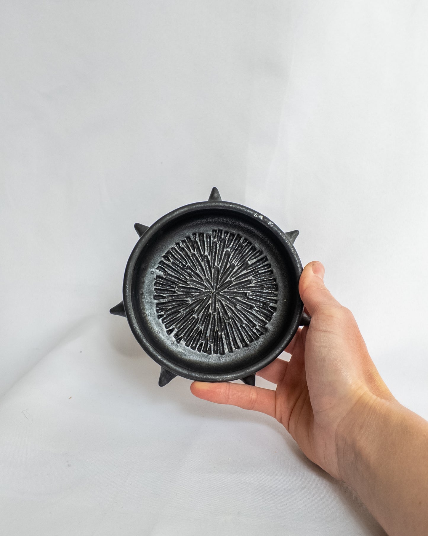 Spiky garlic grater