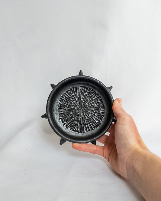 Spiky garlic grater