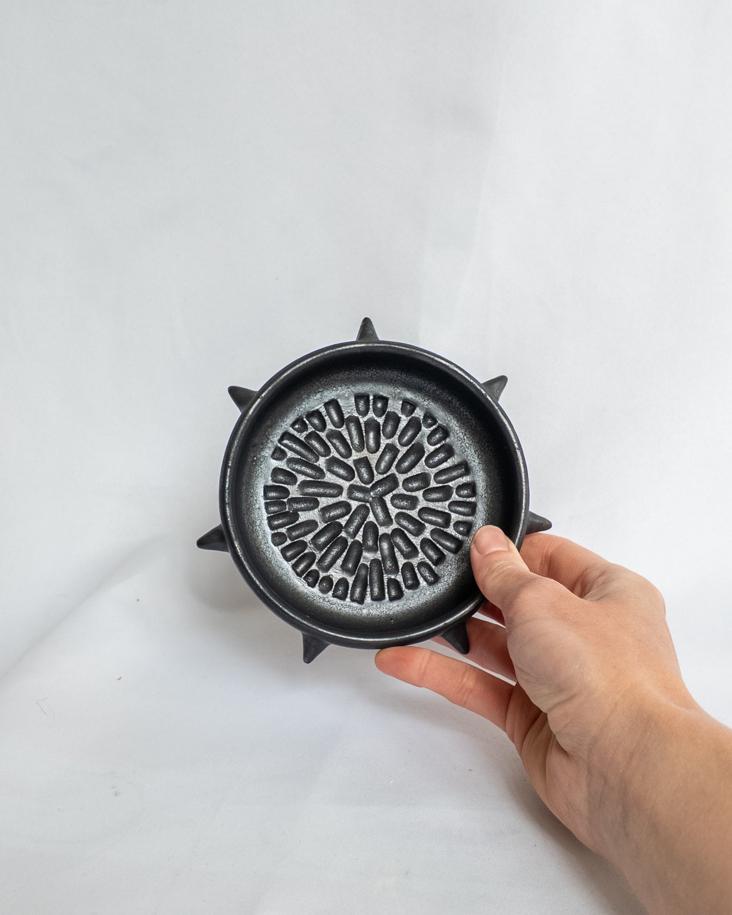 Spiky garlic grater