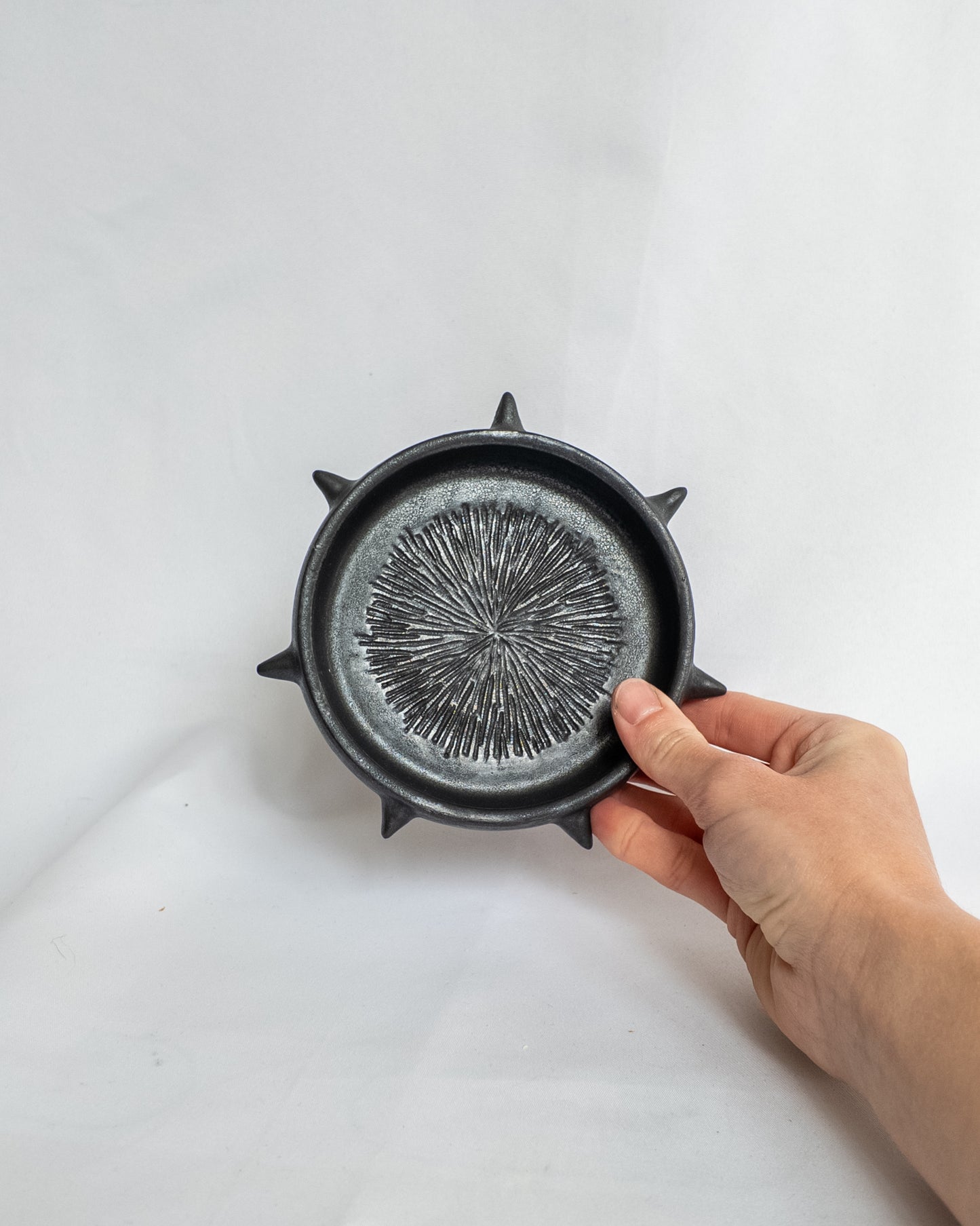 Spiky garlic grater