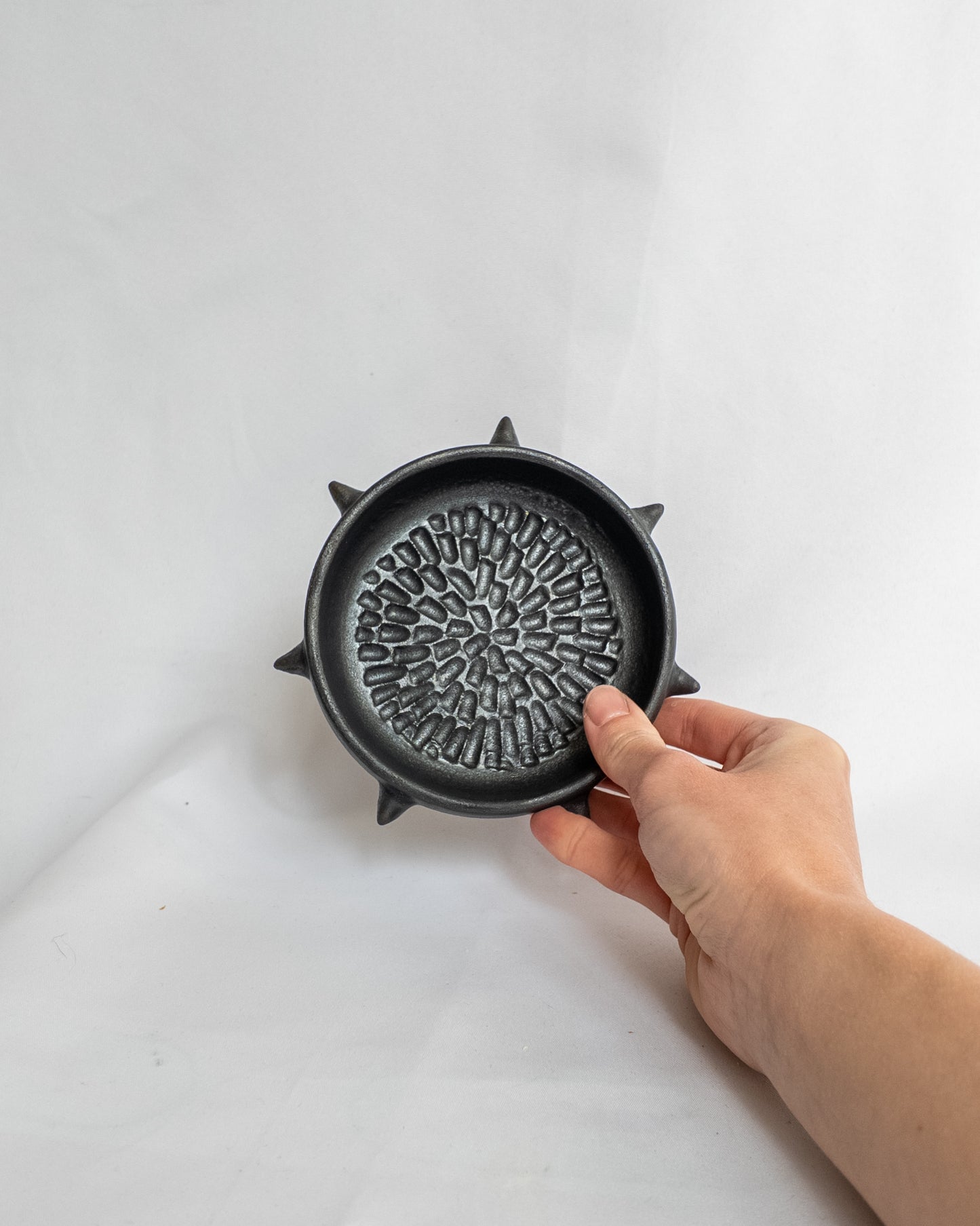 Spiky garlic grater