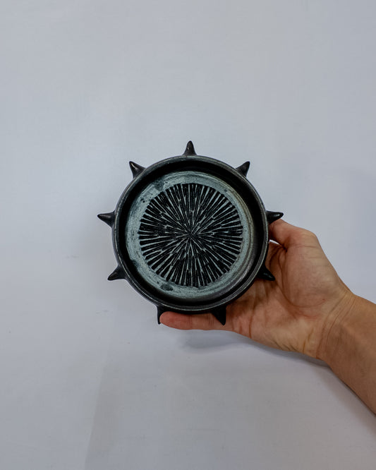 Spiky garlic grater