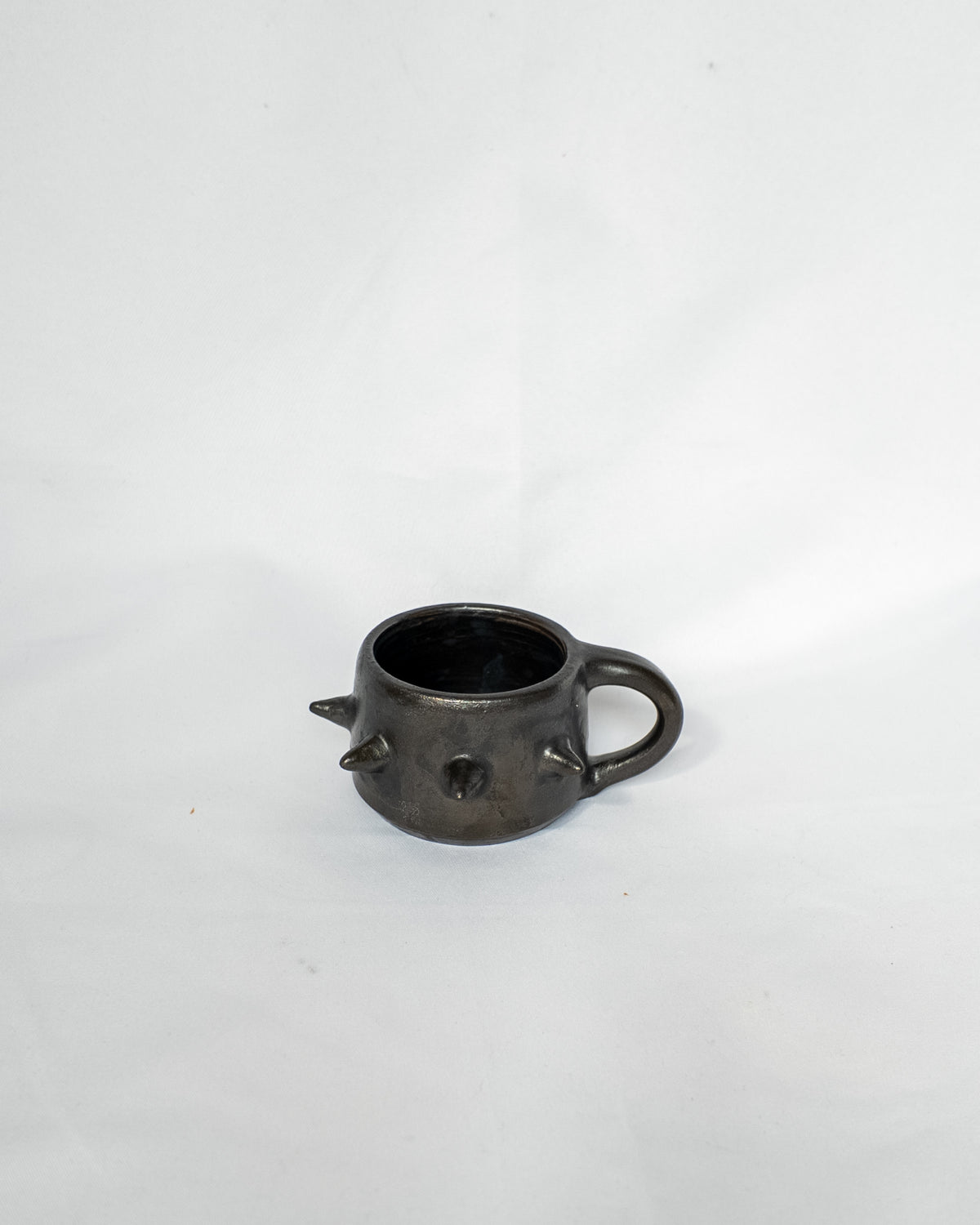 Spiky espresso cup with handle