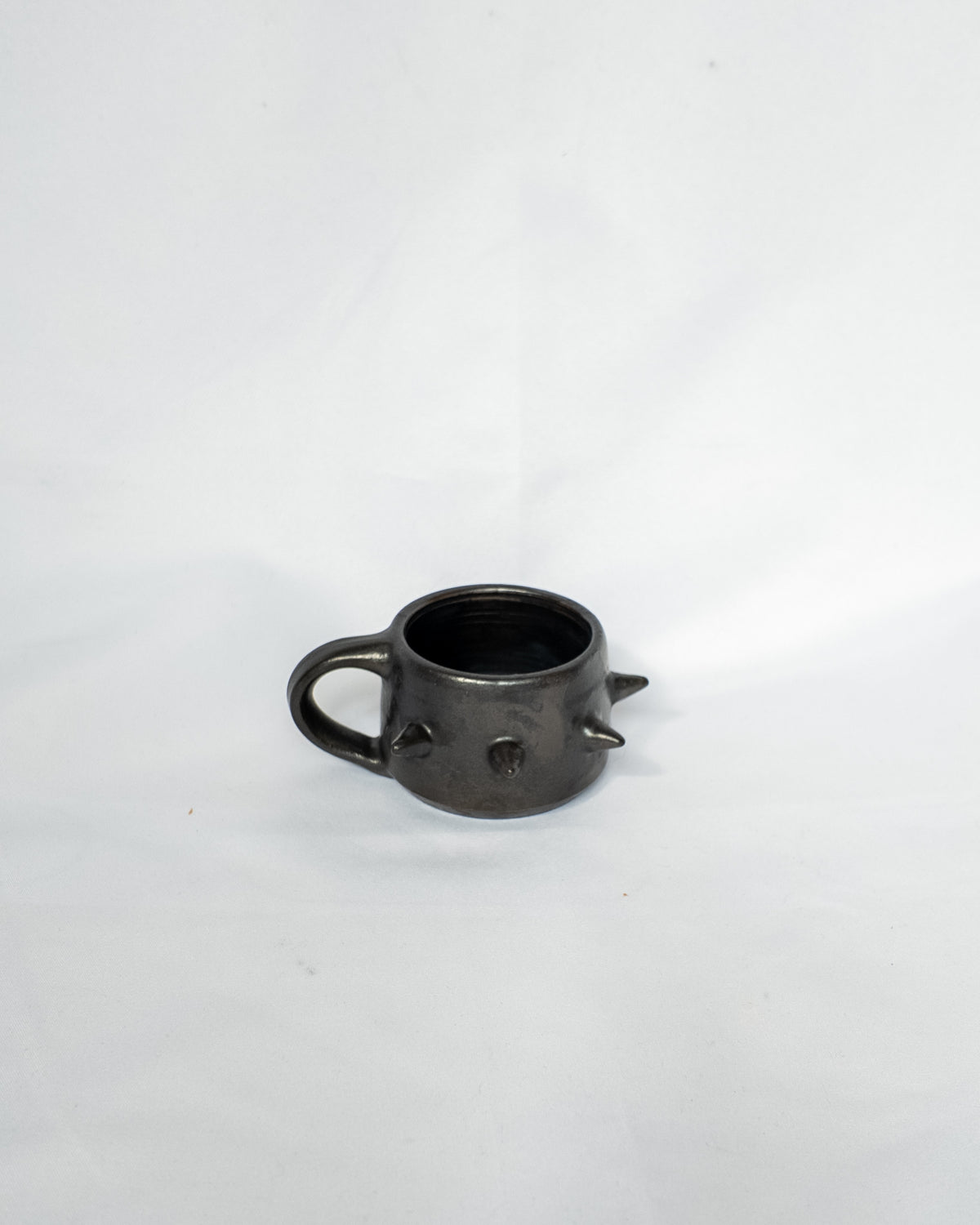 Spiky espresso cup with handle