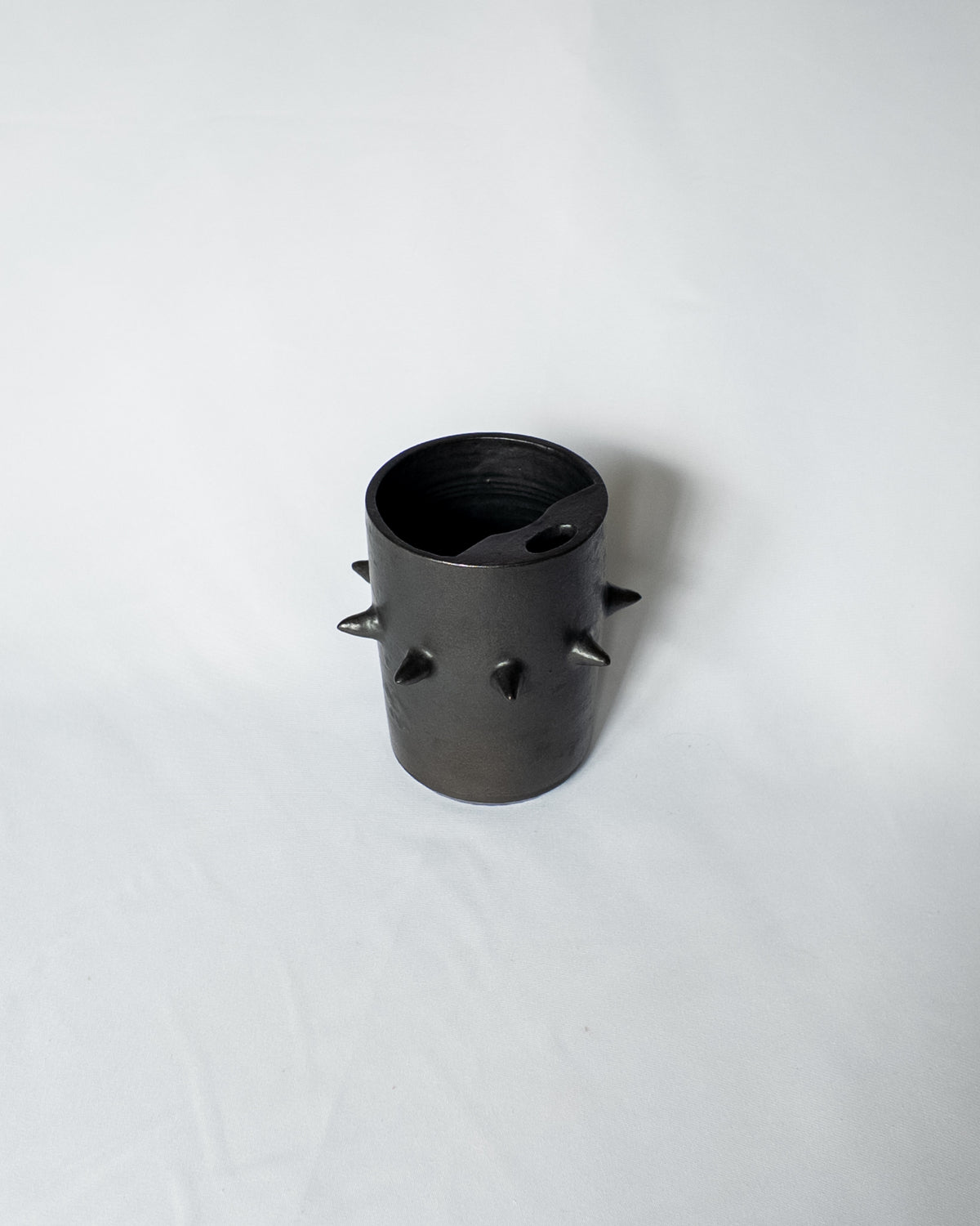 Spiky ceramic travel cup