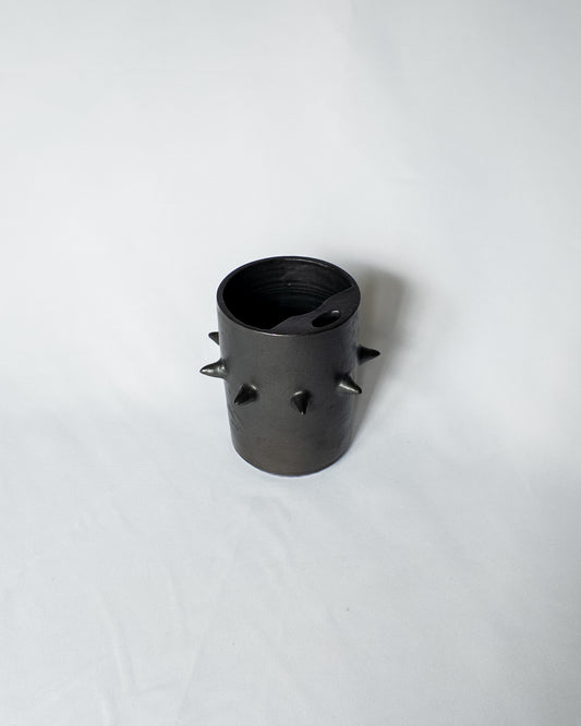Spiky ceramic travel cup