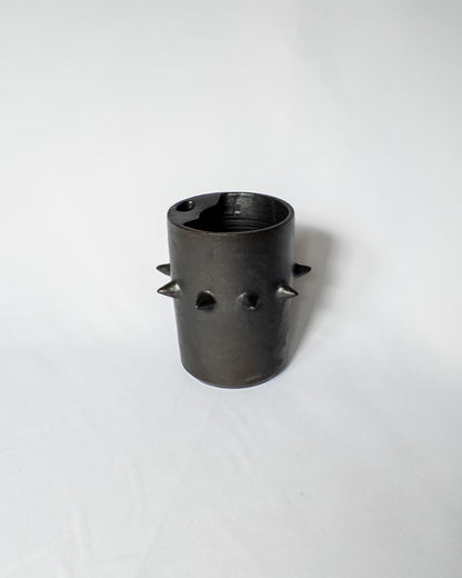 Spiky ceramic travel cup