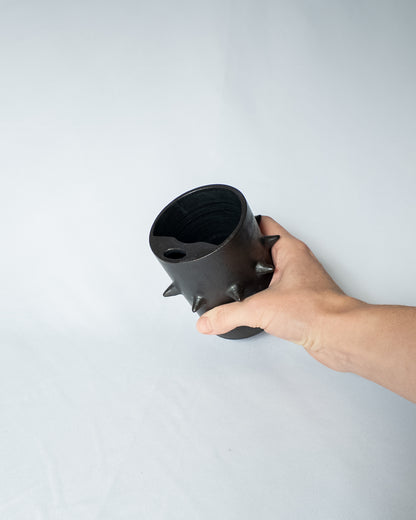 Spiky ceramic travel cup