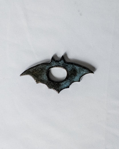 Bat thumb book holder
