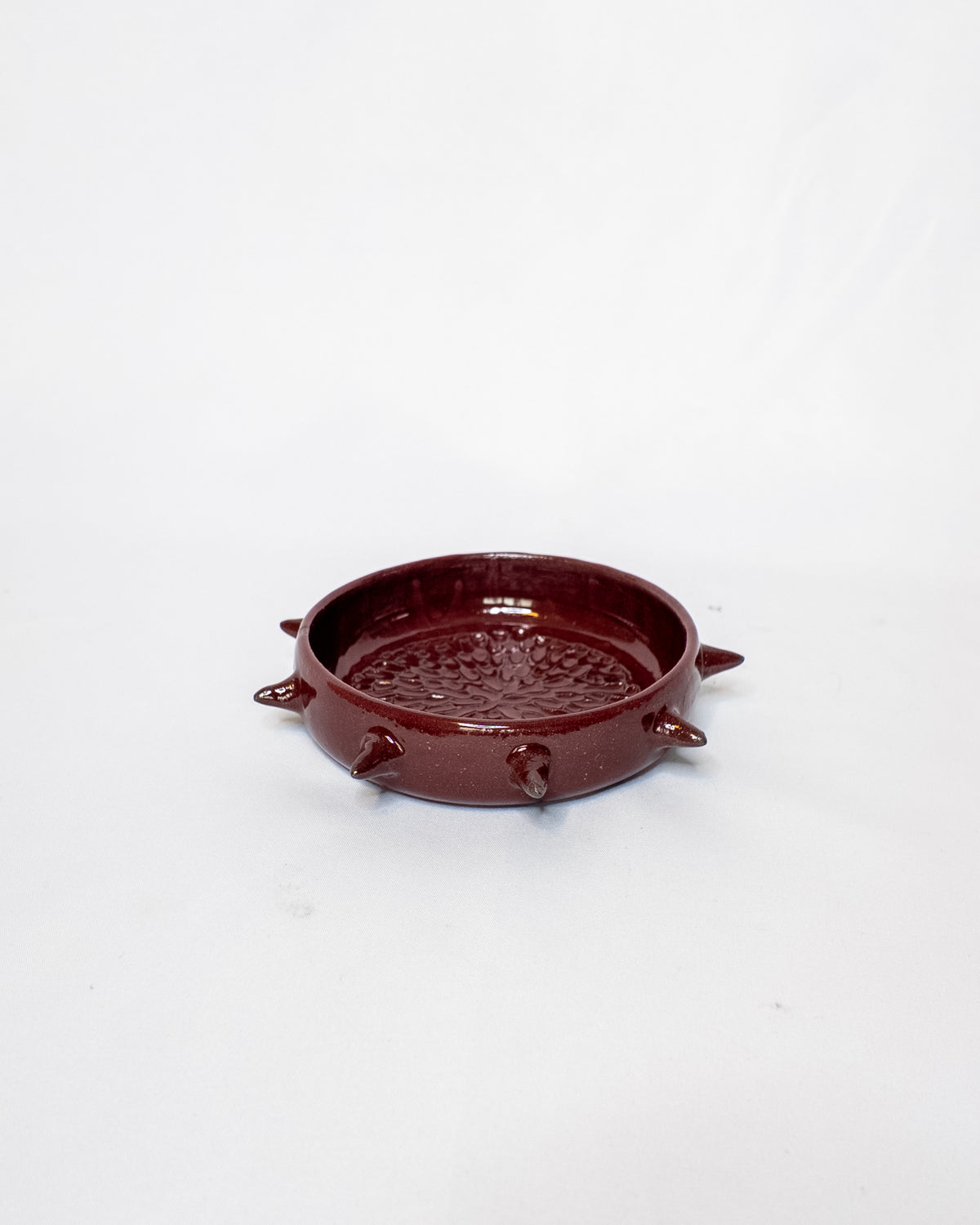 Red spiky garlic grater