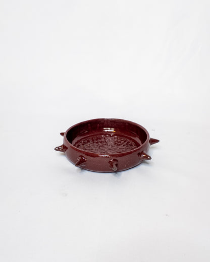 Red spiky garlic grater