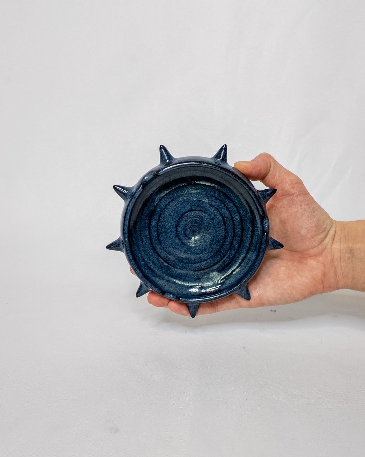 Blue spiky ash tray