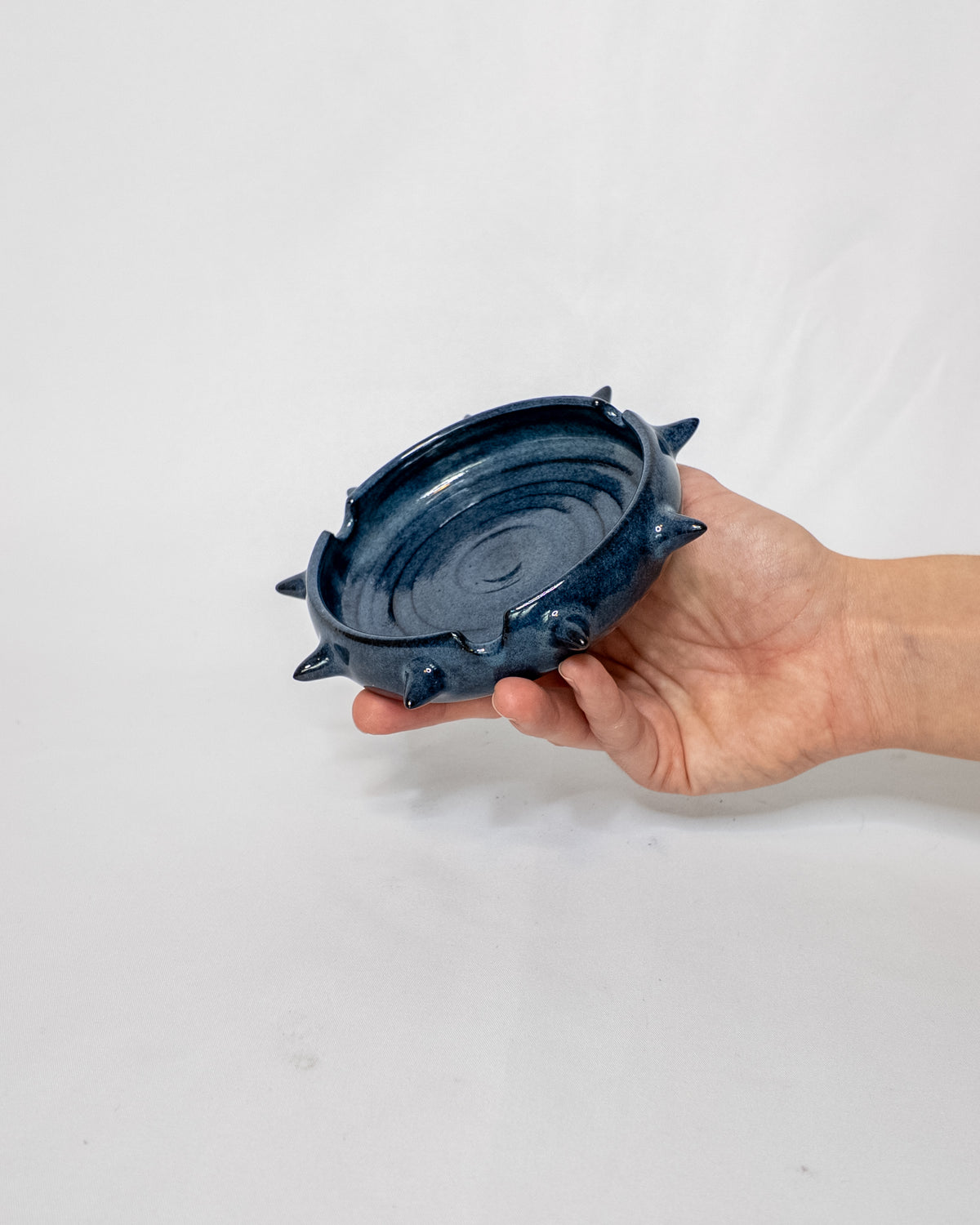 Blue spiky ash tray