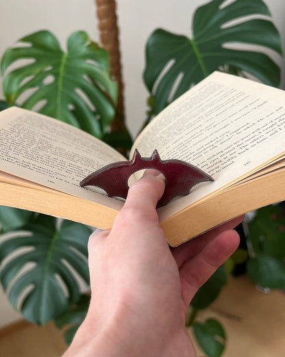 Bat thumb book holder